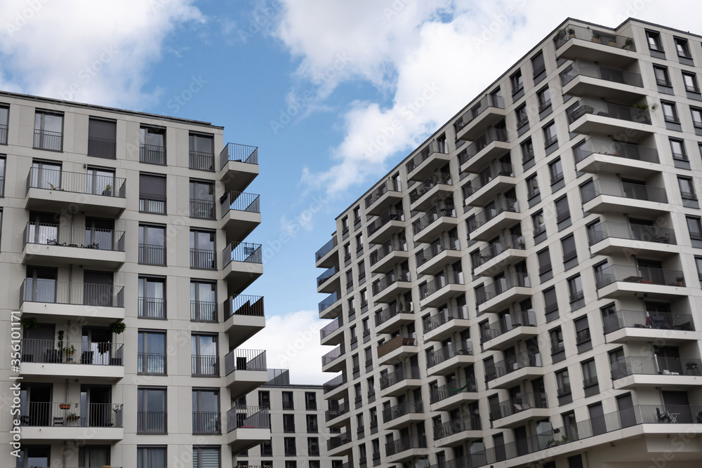 Modern large apartment buildings with balconies in Berlin.