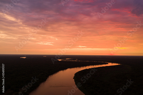 Sunset reflection over the Cuiaba river, Pantanal, Brazil  