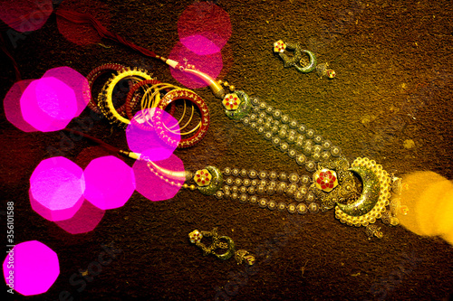 necklace and bracelets with bokeh effect photo