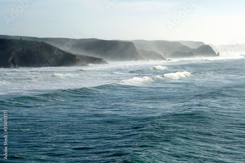 waves rolling against cliffs at Portugals Wild West coast