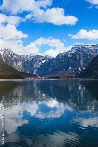 View idyllic Alpine mountains and lake. Sunny winter morning in Hallstatt, Austria