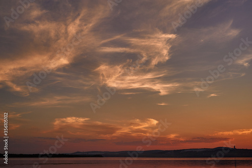 sky at sunset in warm tones and mottled blocks © dimm86
