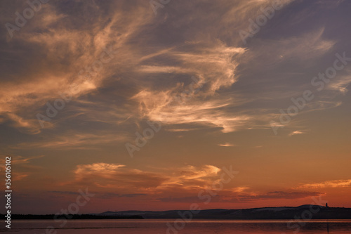 sky at sunset in warm tones and mottled blocks