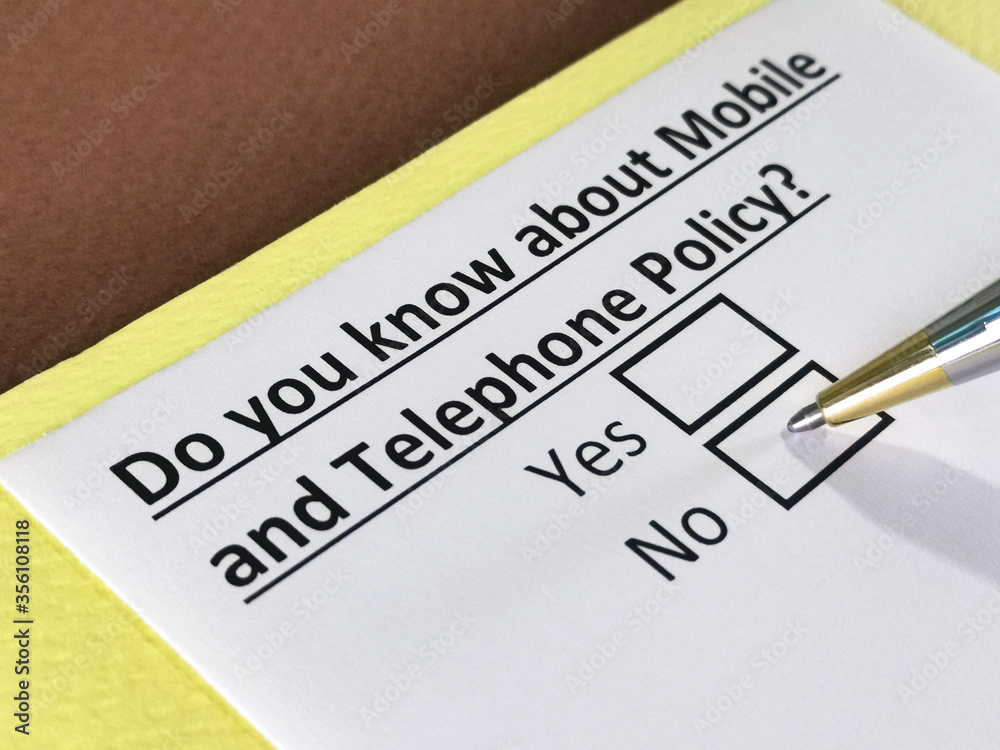 One person is answering question about mobile and telephone policy. One person is answering question about mobile and telephone policy.