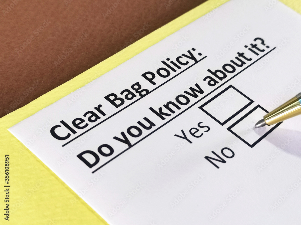 One person is answering question about clear bag policy. One person is answering question about clear bag policy.