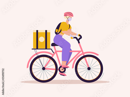 Fototapeta Naklejka Na Ścianę i Meble -  Woman courier with package on bicycle, contactless delivery