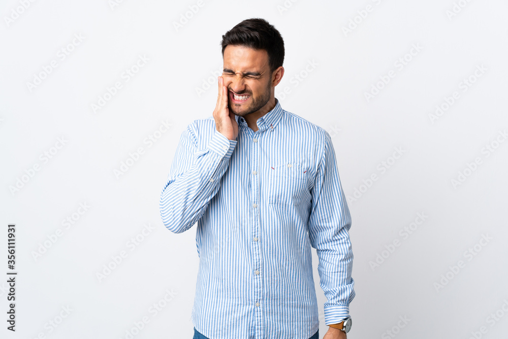Young handsome man over isolated background with toothache Young handsome man over isolated background with toothache