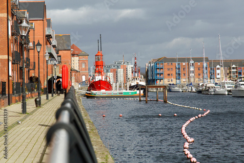 Swansea Marina. Apartments surround the quay where yachts are moored. photo