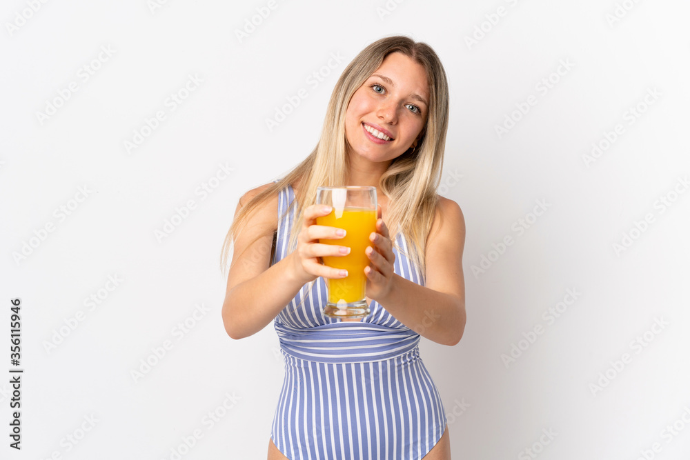 Young blonde woman isolated on white background in swimsuit and holding a cocktail Young blonde woman isolated on white background in swimsuit and holding a cocktail