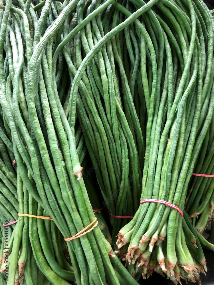 a bunch of green beans in vegetable market a bunch of green beans in vegetable market