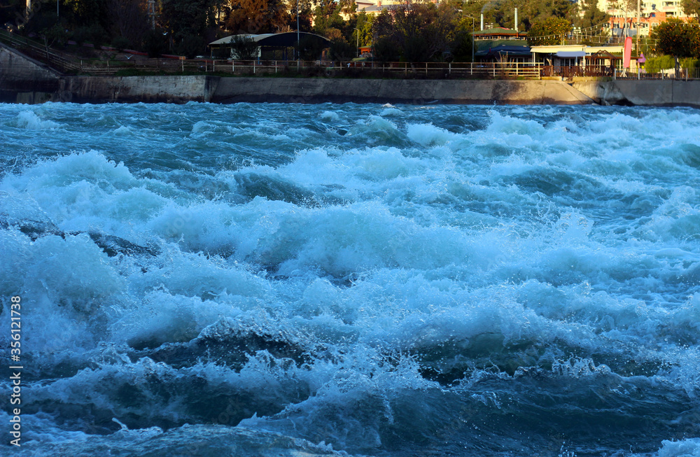 Dam water release, the excess capacity of the dam until springway