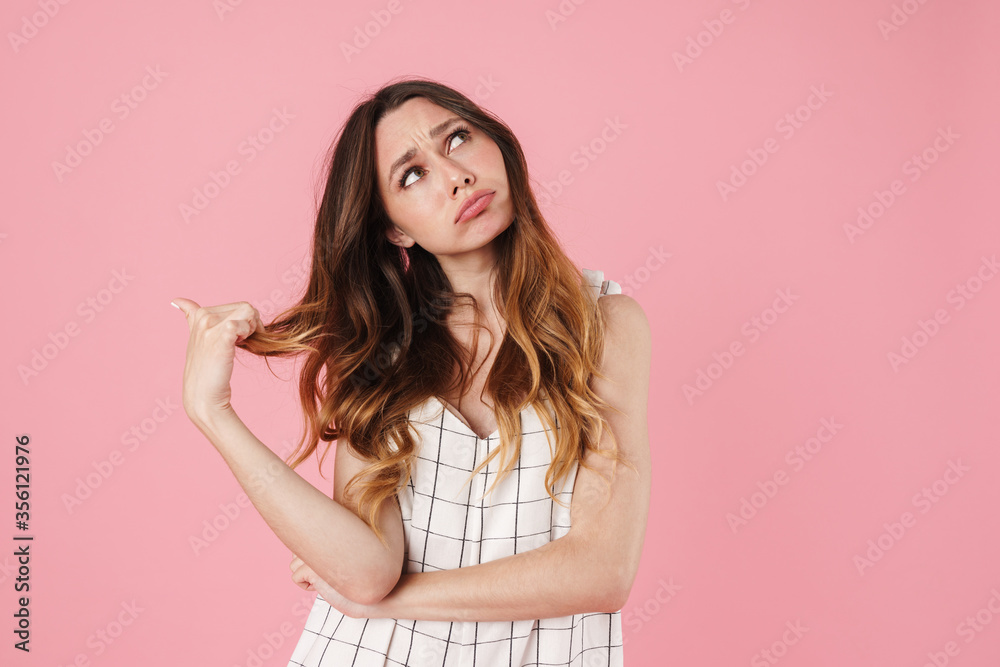 Image of unhappy beautiful woman posing and looking upward Image of unhappy beautiful woman posing and looking upward