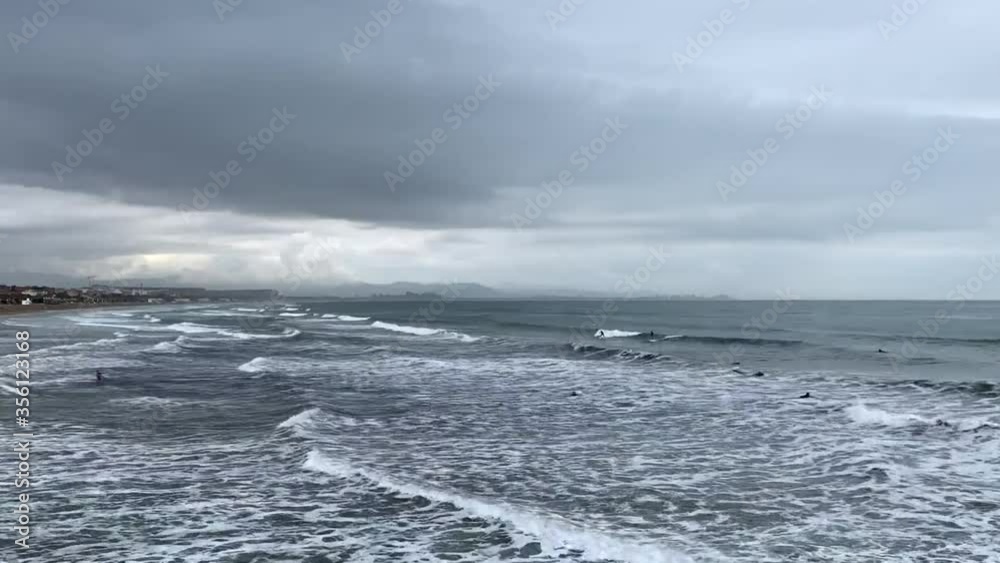 Surfers Bob on the waves