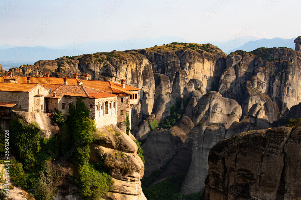 Great view of the monasteries of Meteora in Greece. Landscape with monasteries and rocks in the sunset