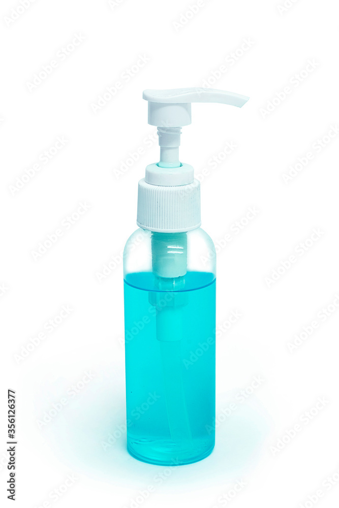 Blue alcohol gel hand sanitizer bottle on white background. selective focus, soft focus. Blue alcohol gel hand sanitizer bottle on white background. selective focus, soft focus.