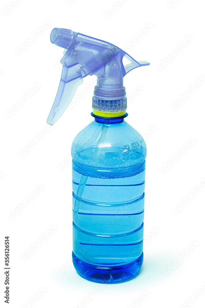 Blue plastic foggy sprayer bottle isolated on white background. selective focus, soft focus. Blue plastic foggy sprayer bottle isolated on white background. selective focus, soft focus.