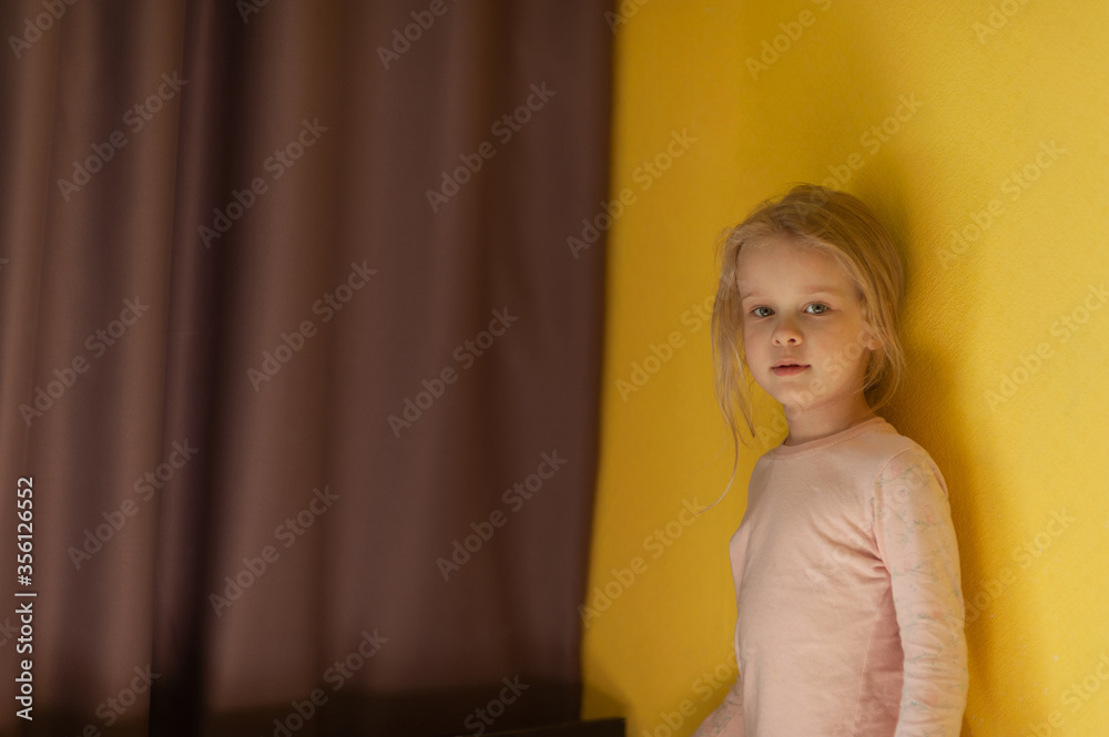 Portrait of a little girl at home. Disheveled little girl at home. Portrait of a little girl at home. Disheveled little girl at home.