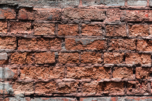 Old whitewashed brick wall. Rusty texture.