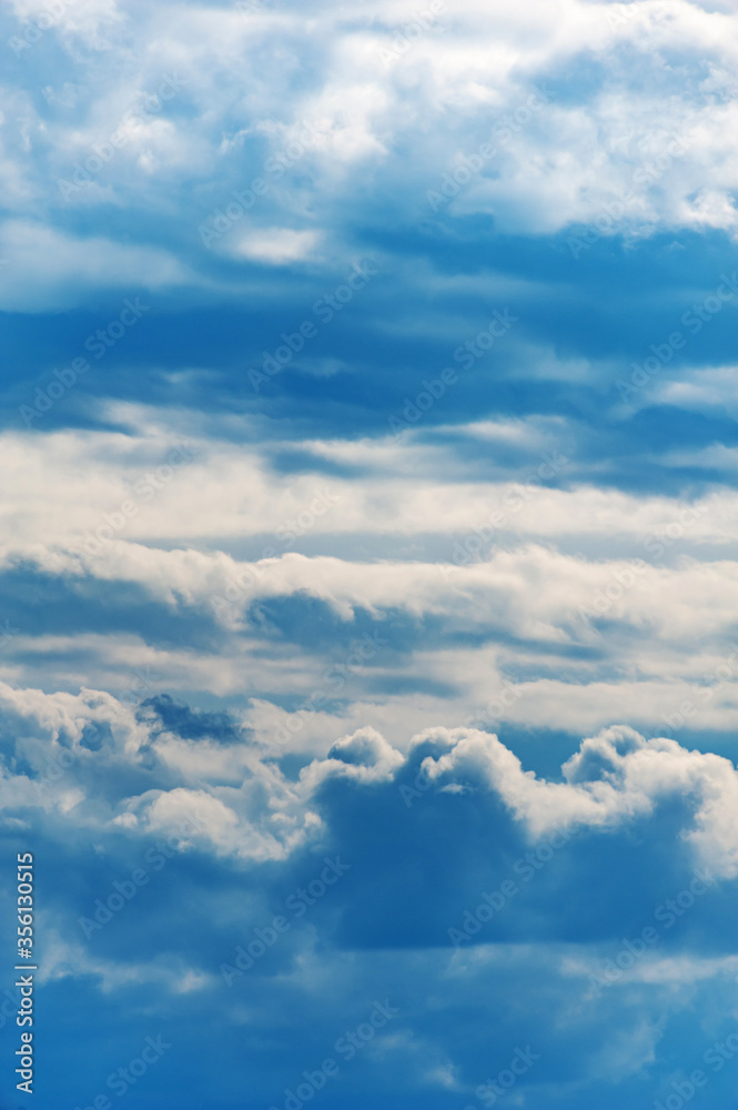 Natural sky composition. Sunny vast blue sky abstract background. Beautiful cloudscape, view over white fluffy clouds. Freedom concept, on the heaven. Element of design. Natural sky composition. Sunny vast blue sky abstract background. Beautiful cloudscape, view over white fluffy clouds. Freedom concept, on the heaven. Element of design.
