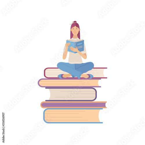 Young smiling woman reading book