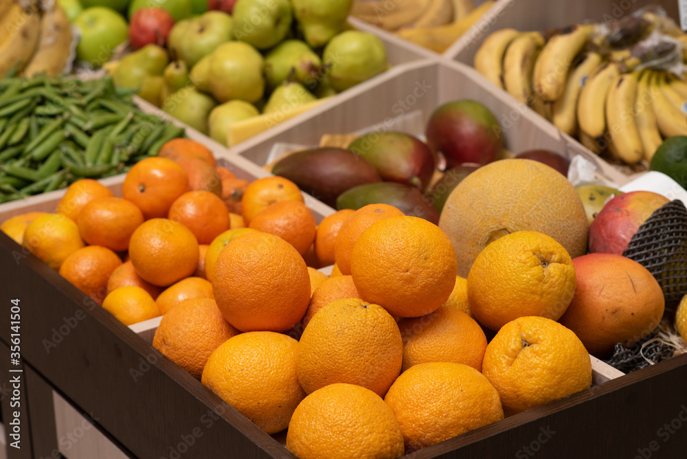 A counter with juicy and delicious fruits. With lots of wholesome food A counter with juicy and delicious fruits. With lots of wholesome food