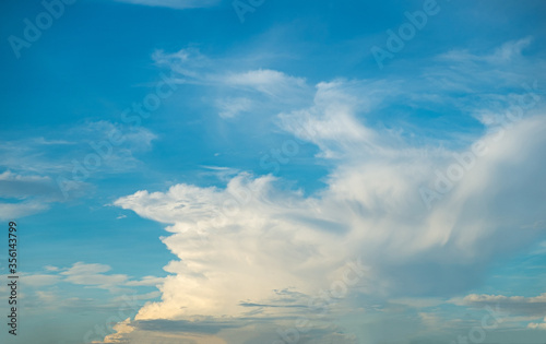 cloudy blue sky view sushine, yellow light background © Jenthum