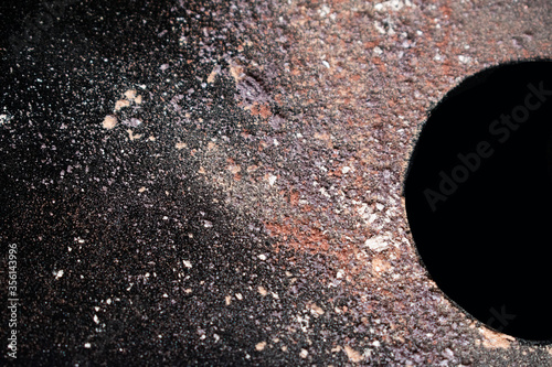 Loose make up powder on black background.Copy space, colorful make up powders.