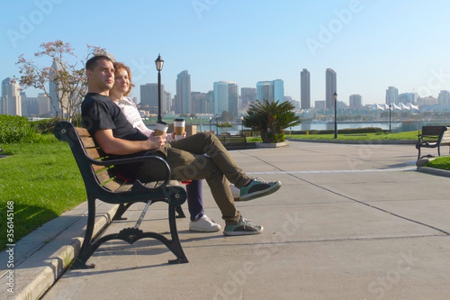 Couple relaxing on San Diego City bench