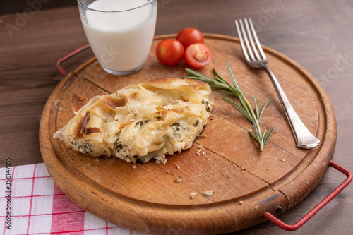 Traditional balkan breakfast - Burek pie with cheese and spinach
