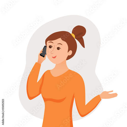 Girl speaking using her smartphone holding in her hand.