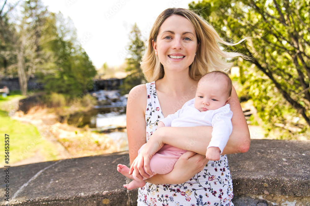 Fototapeta premium Beautiful Mother And Baby outdoors. Mum and her Child playing together
