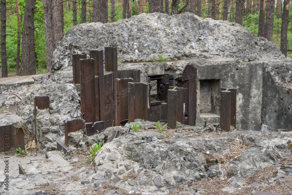 Ruin of a pillbox № 486 of The Kiev Fortified Region in the Pushcha-Vodytsia forest near village Horenka in Ukraine. Pillbox was destroyed during the Second World War War in 1941