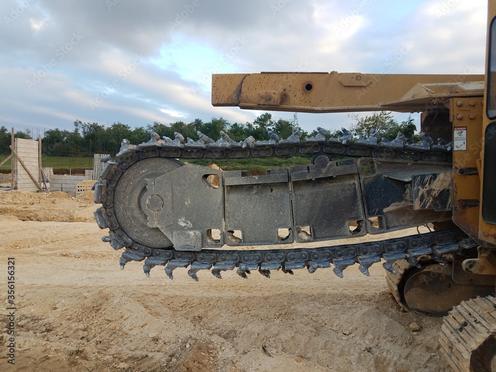 large machine at home construction site that digs ditches in Puerto Rico