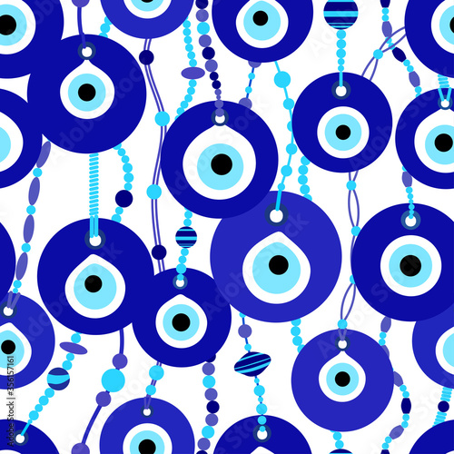 Vector seamless pattern with Turkish evil eye amulet (nazar) with blue and violet beads on a white background. 