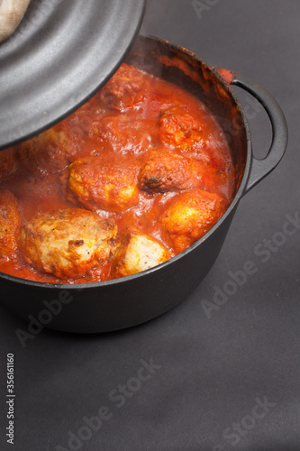 A Libyan dish of potatoes stuffed with minced beef and cooked in a tomato sauce called Mafrum