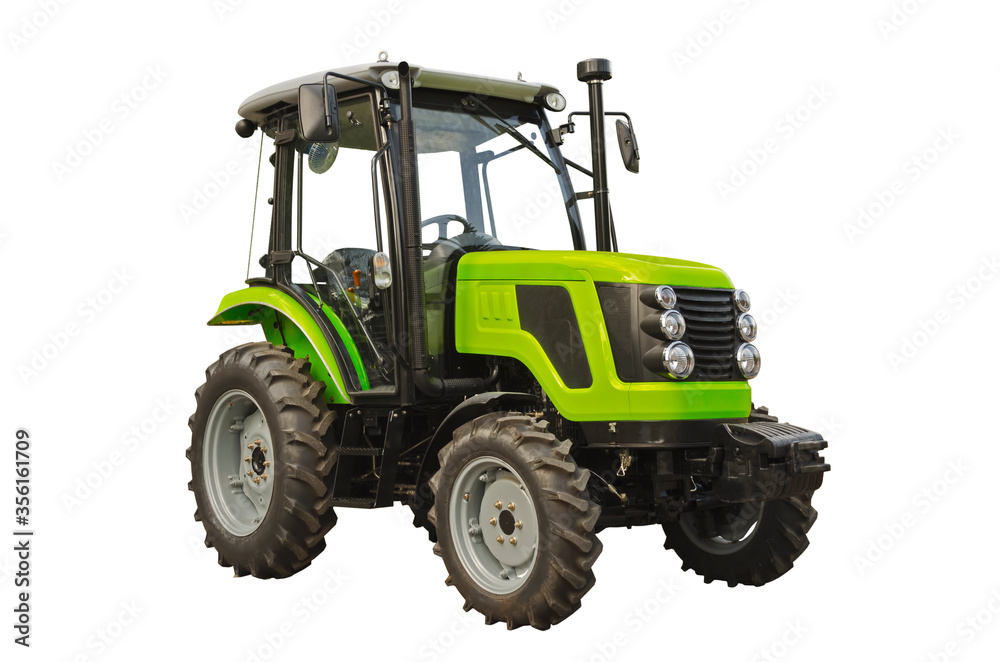Obraz premium Small agricultural tractor isolated on a white background