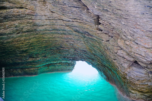 La Grotta Azzura a Mel, Province of Belluno. The magic natural scenery in Italy. The amazing natural grotto.