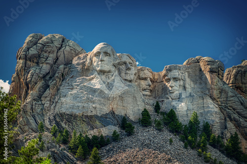  The stone faces of George Washington, Thomas Jefferson, Teddy Roosevelt and Abraham Lincoln stare majestically from the granite rocks of Mount Rushmore in South Dakota.              