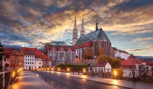Fantastic colorful sky under sunlit during sunset, over the Church of St. Peter and Paul in Gorlitz, Germany, Wonderful picturesque scene, Amazing Colorful Cityscape. Awesome creative image. Postcard photo