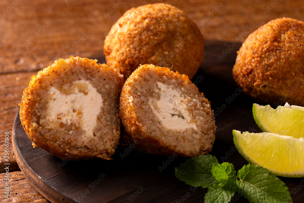 Potato Kibbeh - Middle Eastern minced dry curd wheat fried snack made with potato. Also popular party dish in Brazil (kibe) Potato Kibbeh - Middle Eastern minced dry curd wheat fried snack made with potato. Also popular party dish in Brazil (kibe)