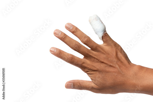 hands and the little finger have a white bandage