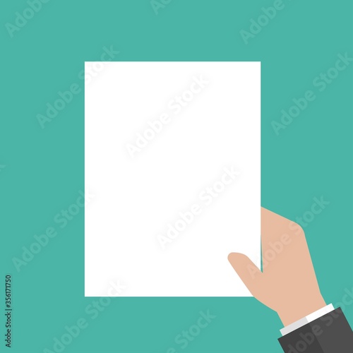 Hand of businessman holding white sheet of paper.