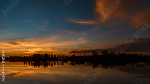 Beautiful sunset with reflections at Ettling  Isar  Bavaria  Germany