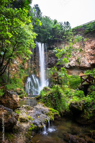 Waterfall in a forest on a clean and speed river. Veliki Buk in Lisine  Serbia.