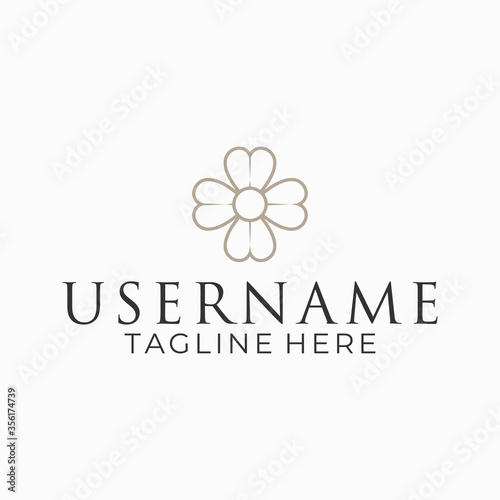 Design a floral logo with a feminine style.