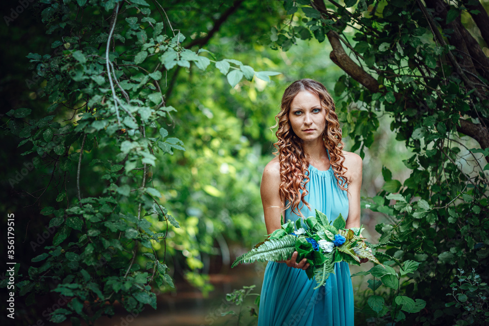 a beautiful young woman celebrates in the woods the solstice day a beautiful young woman celebrates in the woods the solstice day