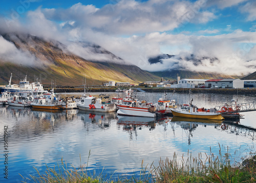 Bolungarvik, Iceland / Iceland - september 2018: Fishing boats in the harbor of Bolungarvik, Iceland.