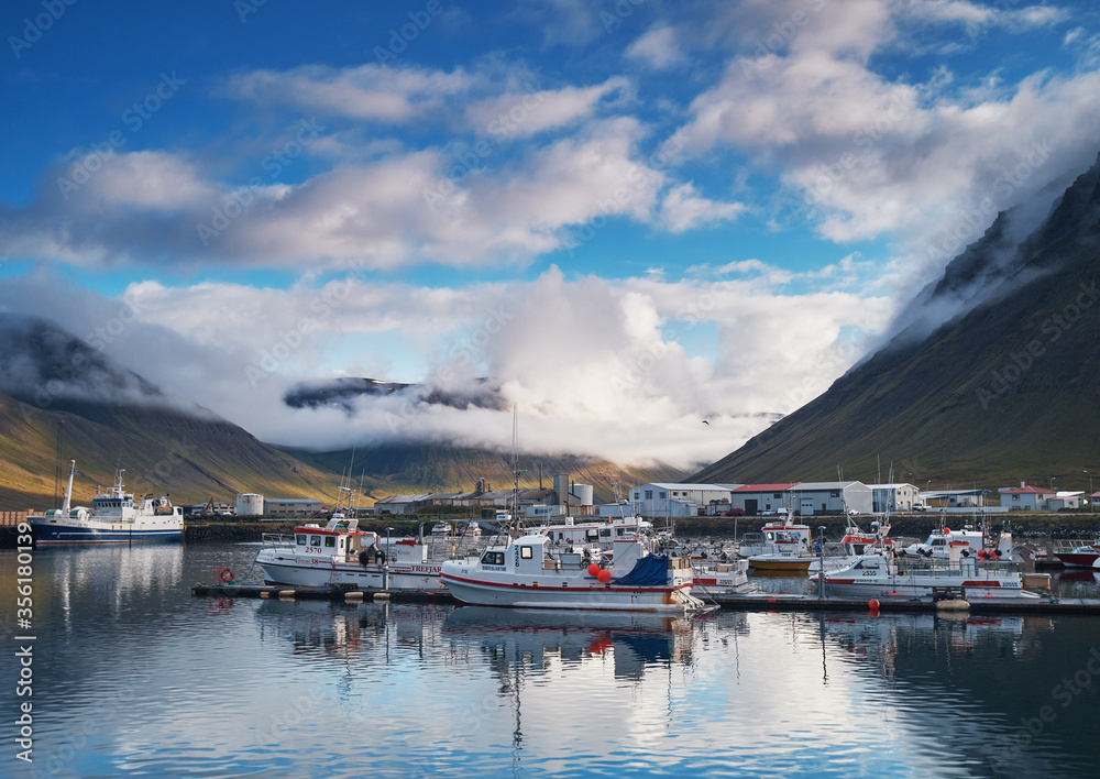 Bolungarvik, Iceland / Iceland - september 2018: Fishing boats in the harbor of Bolungarvik, Iceland.