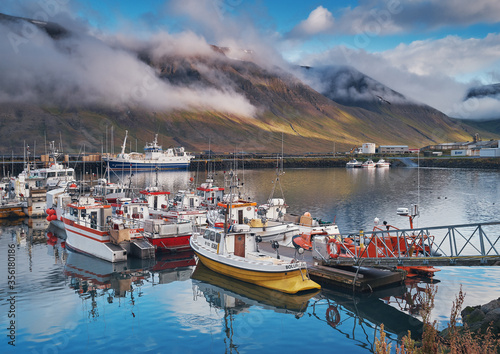 Bolungarvik, Iceland / Iceland - september 2018: Fishing boats in the harbor of Bolungarvik, Iceland.