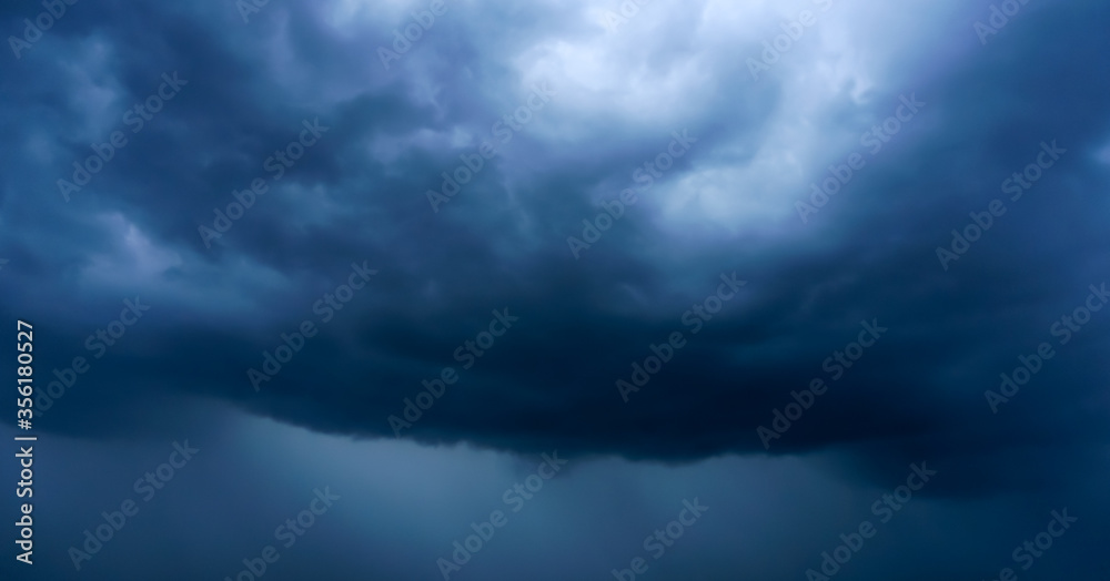 Black rain clouds are forming,A storm is about to occur. Black rain clouds are forming,A storm is about to occur.